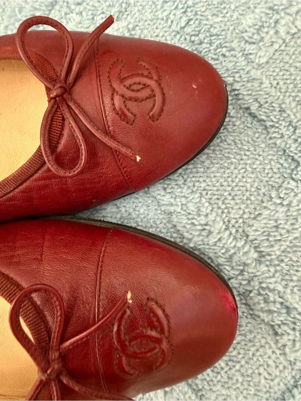 CHANEL Burgundy Leather Ballet Flats with CC Toe Emblem